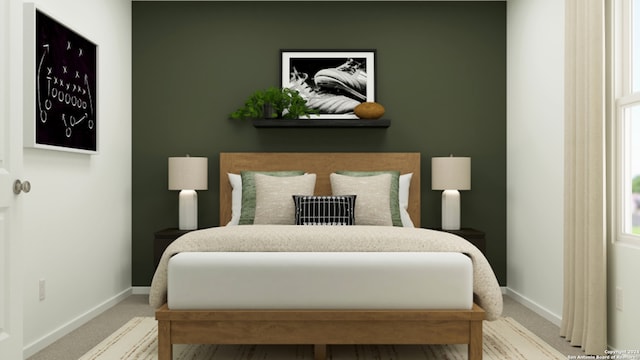bedroom with baseboards and carpet flooring