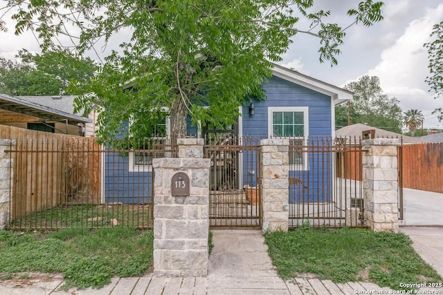view of front of home featuring a gate and a fenced front yard