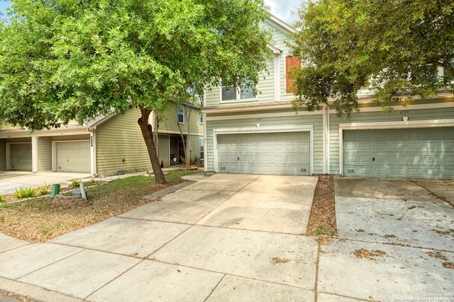 view of front of home featuring an attached garage and driveway