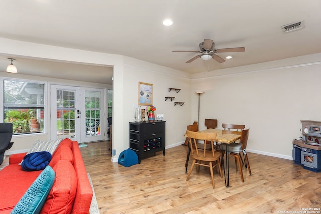 202 Beverly Dr, San Antonio, TX 78228 - dining area featuring french doors, light wood-style flooring, a ceiling fan, recessed lighting, and visible vents