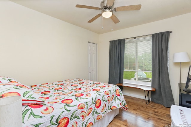 202 Beverly Dr, San Antonio, TX 78228 - bedroom featuring baseboards, a ceiling fan, and wood finished floors