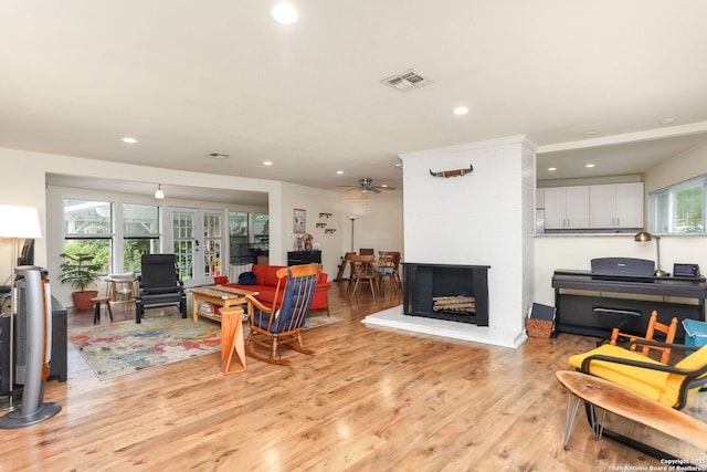202 Beverly Dr, San Antonio, TX 78228 - living room featuring recessed lighting, visible vents, a healthy amount of sunlight, and light wood finished floors