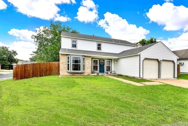 traditional-style home with a garage, a front lawn, fence, a shingled roof, and driveway