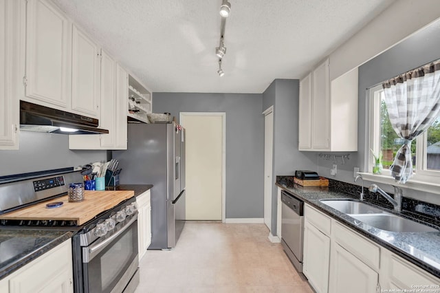 8034 Deadwood Rdg, Converse, TX 78109 - kitchen featuring under cabinet range hood, stainless steel appliances, white cabinets, and a sink