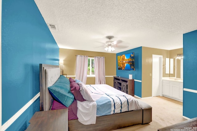 8034 Deadwood Rdg, Converse, TX 78109 - bedroom featuring carpet flooring, a textured ceiling, a ceiling fan, baseboards, and visible vents