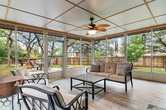 6763 Shadow Run, San Antonio, TX 78250 - sunroom / solarium featuring a ceiling fan, an outdoor living space, and a healthy amount of sunlight
