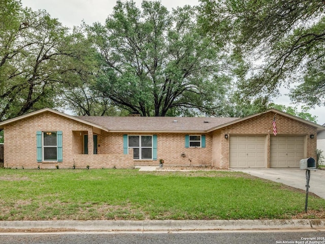 single story home with brick siding, driveway, a front yard, and a garage