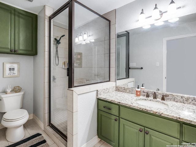 1639 Redwood, Seguin, TX 78155 - full bath featuring vanity, toilet, tile patterned floors, baseboards, and a stall shower
