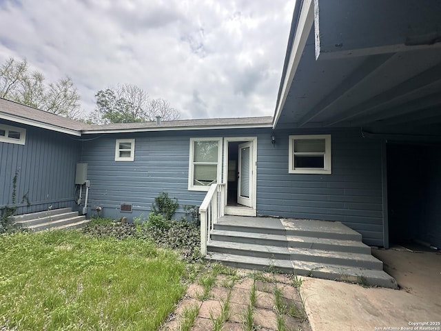 view of exterior entry featuring crawl space