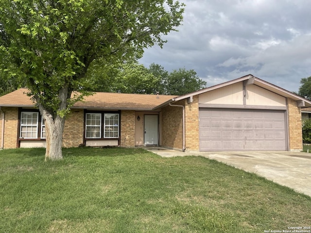single story home with brick siding, an attached garage, driveway, and a front lawn