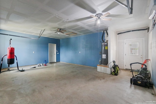 garage featuring water heater and ceiling fan
