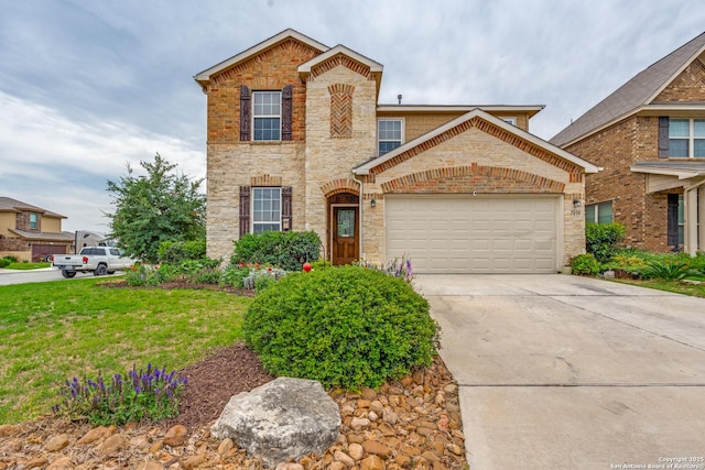 traditional-style house with a front yard, an attached garage, driveway, and stone siding