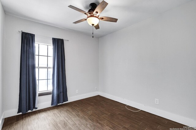 700 Dawson, San Antonio, TX 78202 - spare room with dark wood-style flooring, ceiling fan, and baseboards