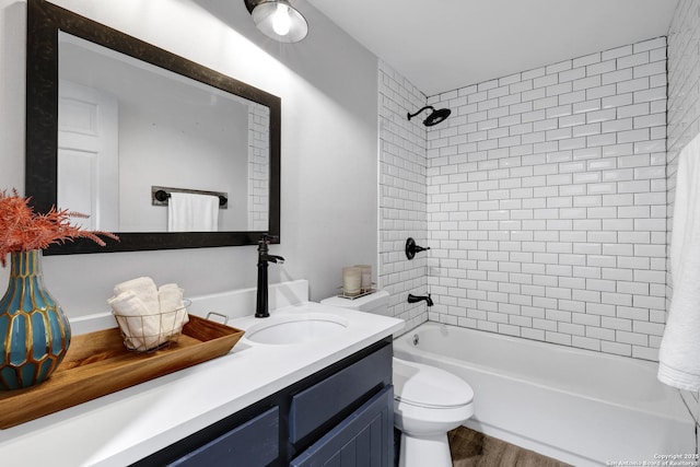 700 Dawson, San Antonio, TX 78202 - bathroom featuring vanity, bathtub / shower combination, toilet, and wood finished floors