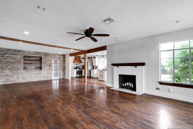 700 Dawson, San Antonio, TX 78202 - unfurnished living room with a ceiling fan, visible vents, a fireplace with flush hearth, wood finished floors, and recessed lighting