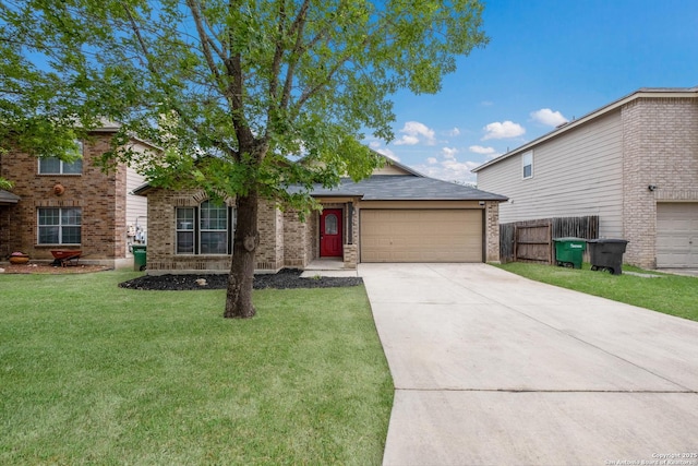 view of front of home featuring a garage, fence, a front yard, brick siding, and driveway