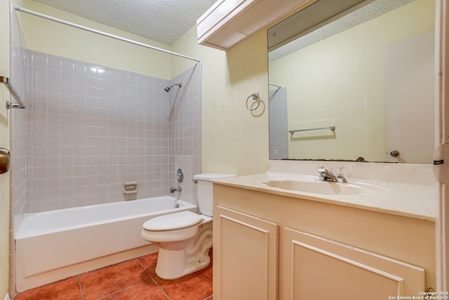 bathroom with shower / tub combination, tile patterned flooring, vanity, toilet, and a textured ceiling