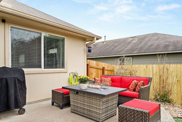 view of patio / terrace featuring grilling area, fence, and outdoor lounge area
