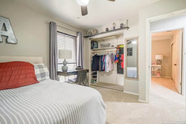 bedroom featuring a closet, a ceiling fan, and carpet