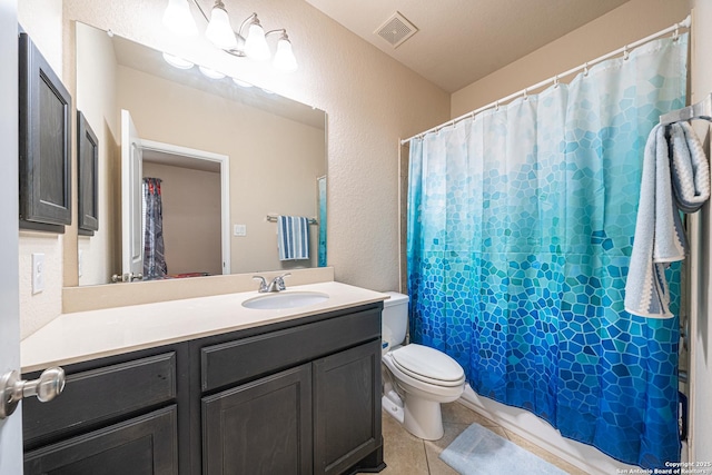 bathroom featuring a shower with curtain, visible vents, tile patterned floors, vanity, and toilet
