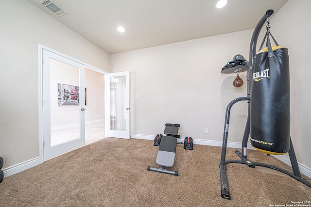 workout area featuring visible vents, carpet floors, baseboards, recessed lighting, and french doors