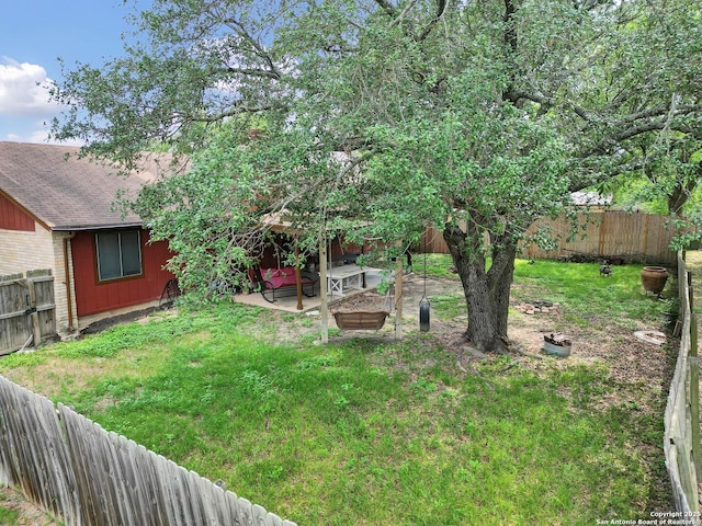 view of yard with a patio and a fenced backyard