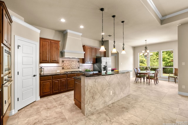 300 Knoll Spgs, Boerne, TX 78006 - kitchen with appliances with stainless steel finishes, a chandelier, premium range hood, baseboards, and decorative backsplash