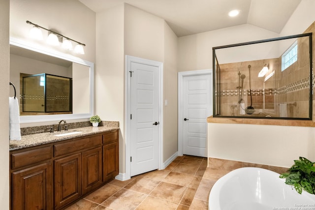 300 Knoll Spgs, Boerne, TX 78006 - full bath with vanity, baseboards, tiled shower, tile patterned floors, and a soaking tub