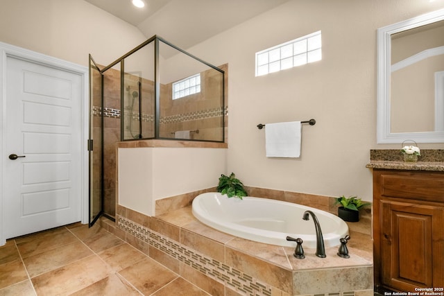 300 Knoll Spgs, Boerne, TX 78006 - bathroom featuring a shower stall, a garden tub, and vanity