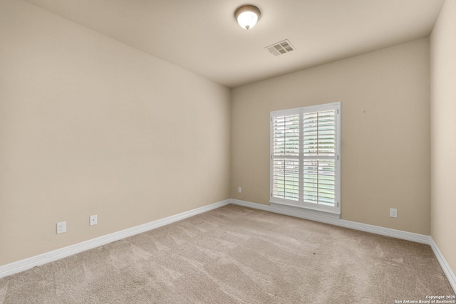 300 Knoll Spgs, Boerne, TX 78006 - empty room with baseboards, visible vents, and light colored carpet