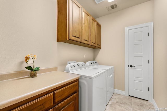 300 Knoll Spgs, Boerne, TX 78006 - washroom with baseboards, washer and clothes dryer, cabinet space, and visible vents