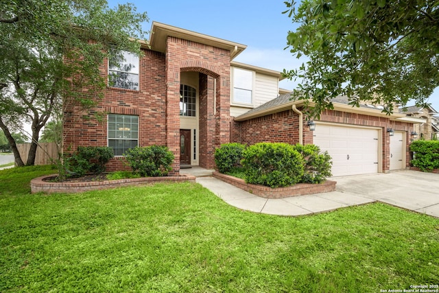 traditional-style home with an attached garage, concrete driveway, a front lawn, and brick siding
