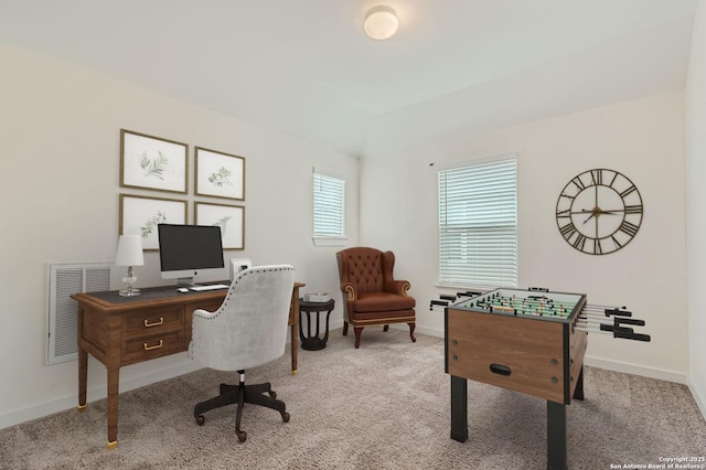 office featuring baseboards, visible vents, and carpet