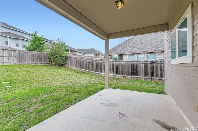 view of yard with a patio and a fenced backyard