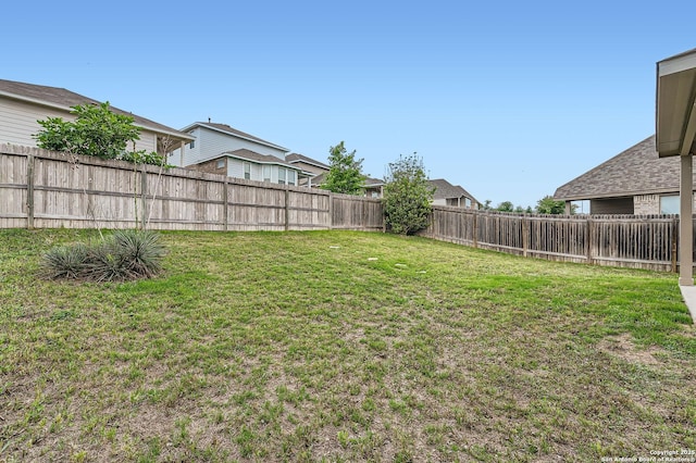 view of yard featuring a fenced backyard