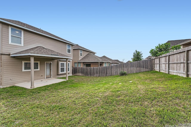 view of yard featuring a fenced backyard and a patio area