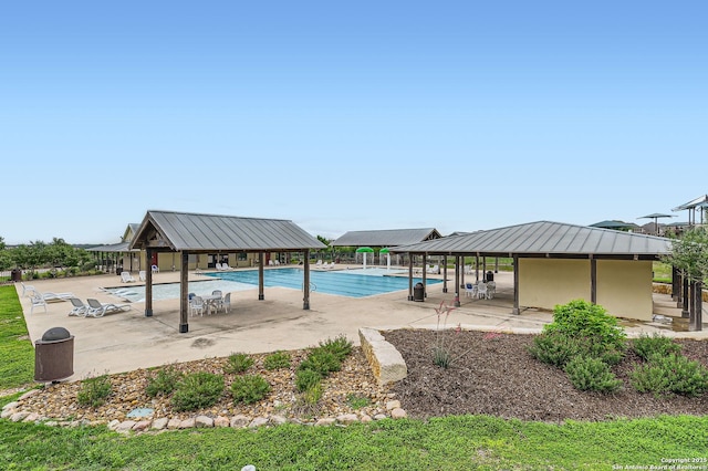 community pool with a patio
