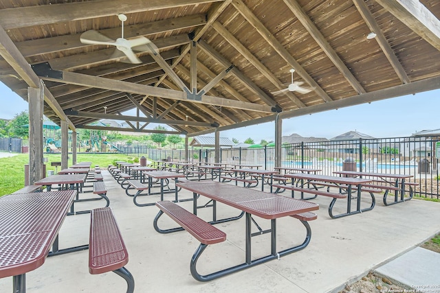 view of community with fence