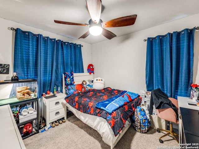 bedroom featuring a ceiling fan and carpet flooring