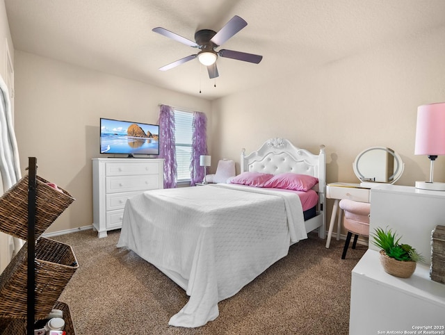 bedroom with baseboards, a ceiling fan, and carpet
