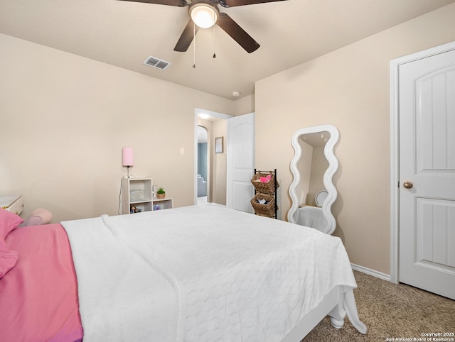 bedroom with carpet floors, a ceiling fan, baseboards, and visible vents