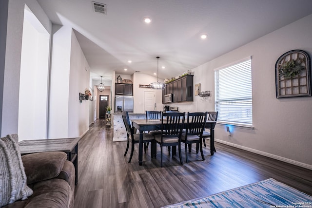 dining room with visible vents, dark wood finished floors, baseboards, a notable chandelier, and recessed lighting