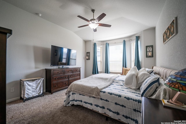 bedroom featuring carpet floors, ceiling fan, and vaulted ceiling