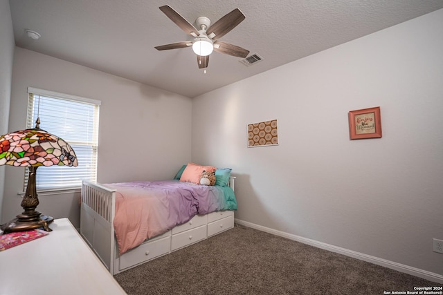 bedroom featuring baseboards, ceiling fan, carpet flooring, and visible vents