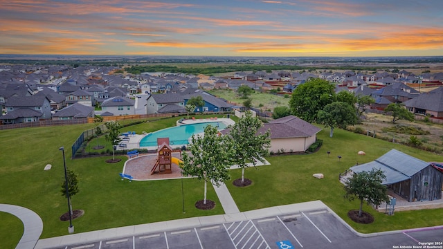 aerial view at dusk with a residential view