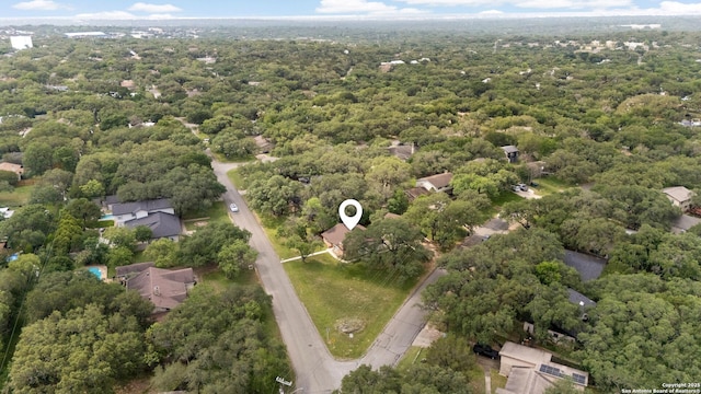 aerial view featuring a view of trees