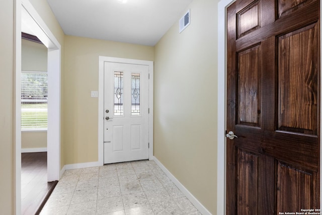 entrance foyer featuring visible vents and baseboards