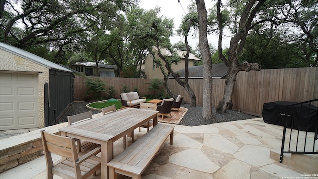 view of patio / terrace with outdoor dining area and a fenced backyard