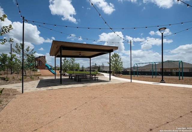 view of property's community with a gazebo and playground community