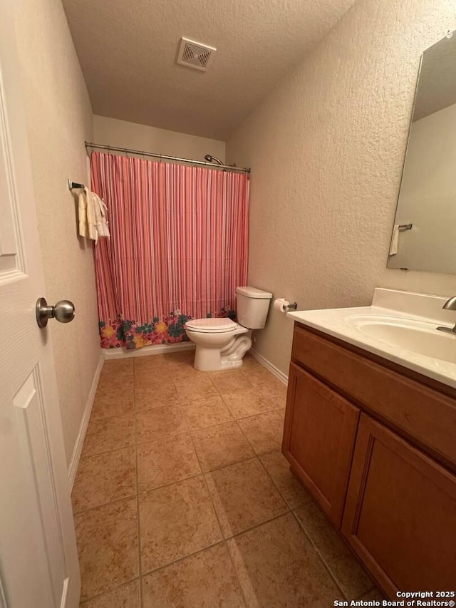 bathroom featuring visible vents, tile patterned flooring, vanity, toilet, and a shower with curtain